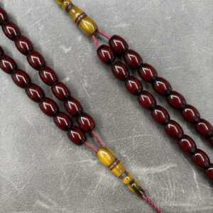 Sıkma Kehribarı – İmame Tıraşlı – Sürmeli Vişne – 9X12 mm – Fıçı Kesim Kilit Habbe